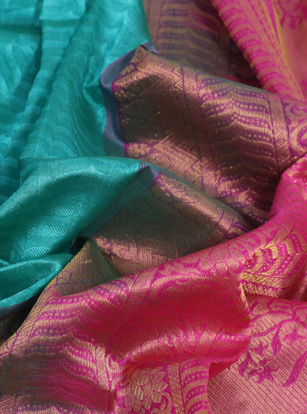 Silk cotton saree teal green and pink with allover self emboss & jacquard and zari woven border