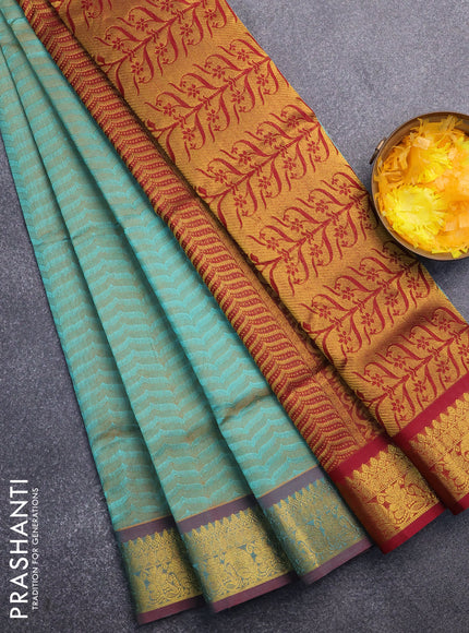 Silk cotton saree dual shade of teal green and maroon with allover self emboss & jacquard and zari woven border