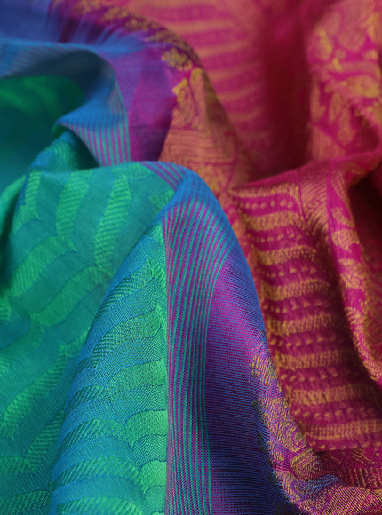 Silk cotton saree dual shade of teal green and pink with allover self emboss & jacquard and zari woven border