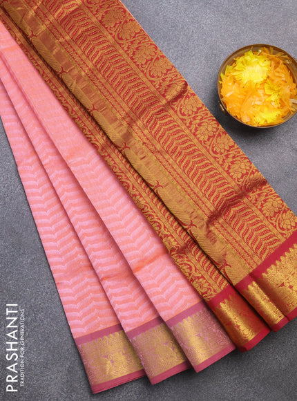 Silk cotton saree dual shade of peach orange and maroon with allover self emboss & jacquard and zari woven border