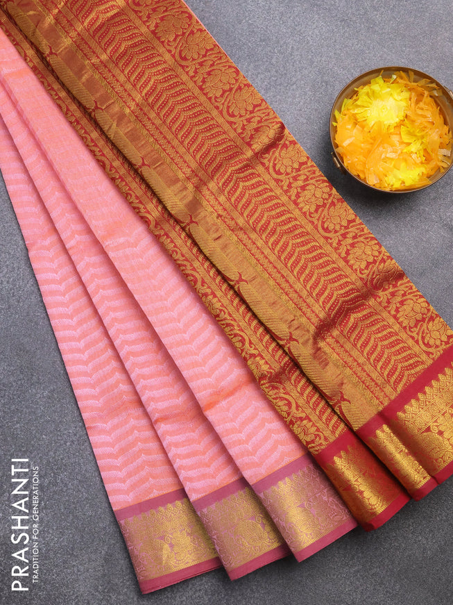 Silk cotton saree dual shade of peach orange and maroon with allover self emboss & jacquard and zari woven border