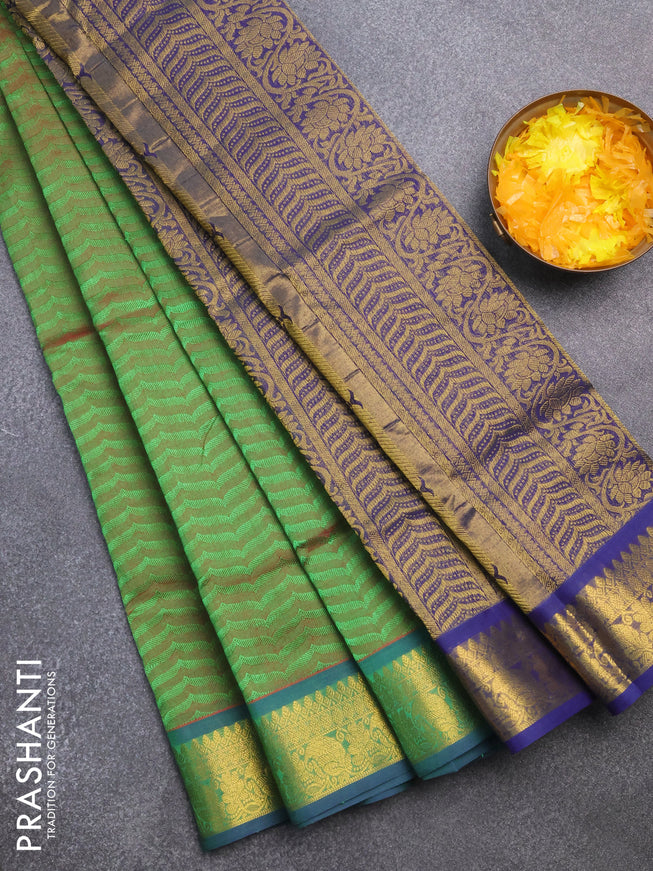 Silk cotton saree dual shade of green and blue with allover self emboss & jacquard and zari woven border