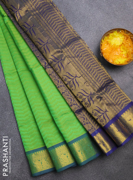 Silk cotton saree light green and blue with allover self emboss & jacquard and zari woven border