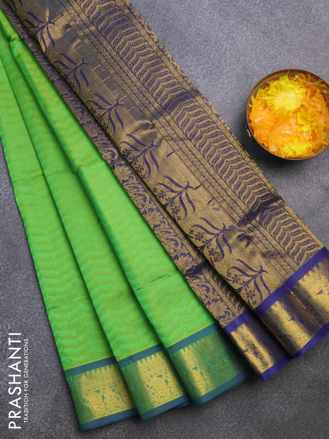 Silk cotton saree light green and blue with allover self emboss & jacquard and zari woven border