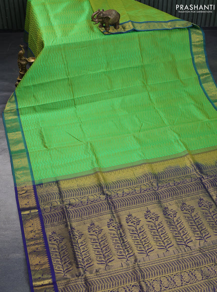 Silk cotton saree light green and blue with allover self emboss & jacquard and zari woven border