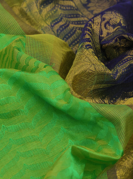 Silk cotton saree light green and blue with allover self emboss & jacquard and zari woven border