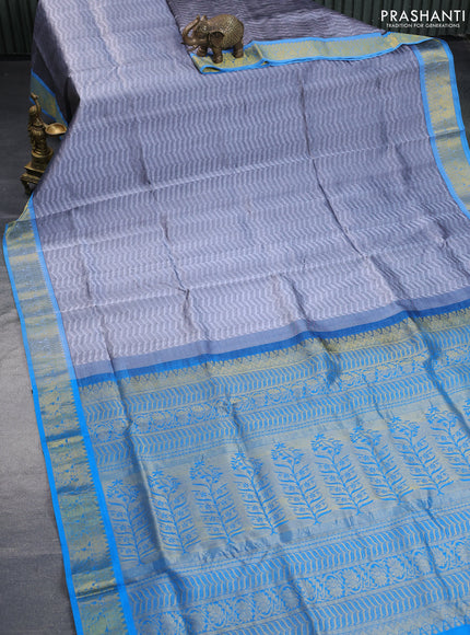 Silk cotton saree grey and cs blue with allover self emboss & jacquard and zari woven border