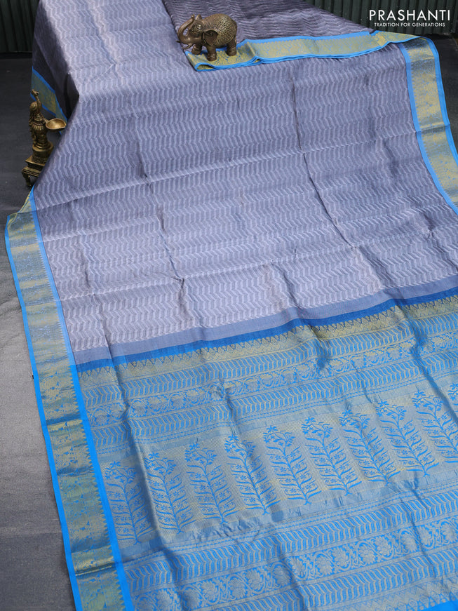 Silk cotton saree grey and cs blue with allover self emboss & jacquard and zari woven border