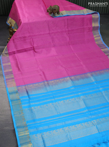 Silk cotton saree light pink and light blue with allover zari checks & buttas and annam & rudhraksha zari woven border