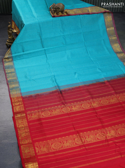 Silk cotton saree teal blue and red with allover zari checks & buttas and annam & rudhraksha zari woven border