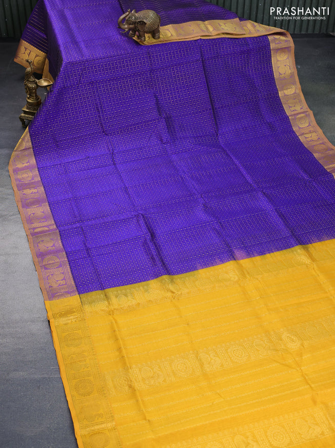 Silk cotton saree blue and mango yellow with allover zari checks & buttas and annam & rudhraksha zari woven border