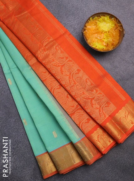 Silk cotton saree teal green shade and orange with annam zari woven buttas and elephant zari woven border