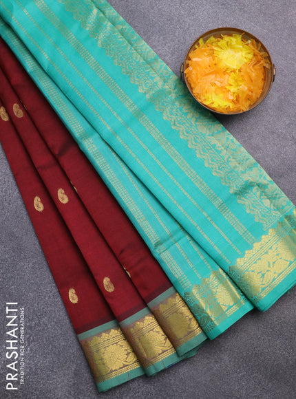 Silk cotton saree maroon and teal green with zari woven buttas and rich zari woven border