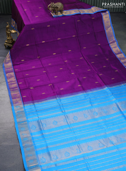 Silk cotton saree purple and cs blue with paisley zari woven buttas and rich zari woven border