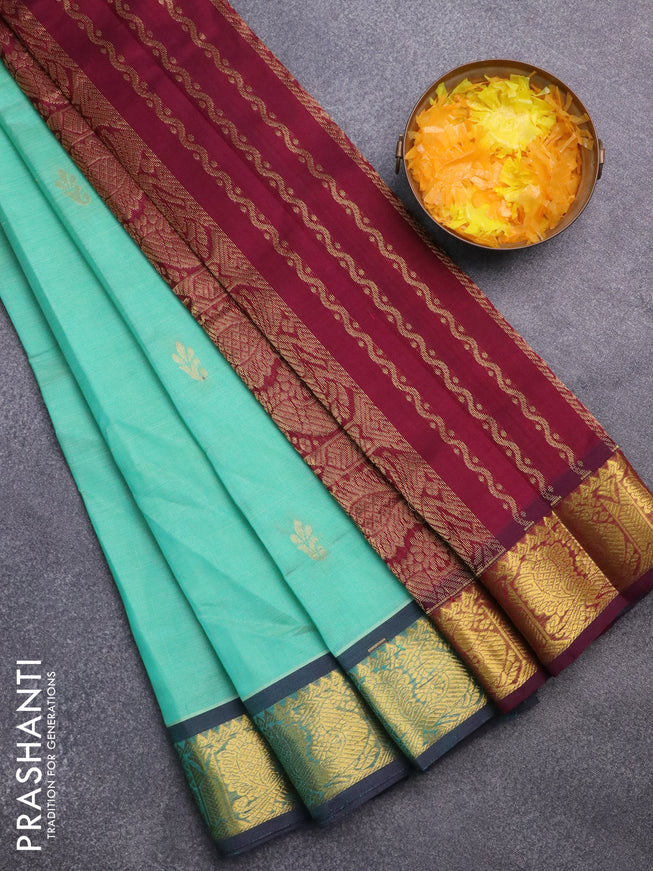 Silk cotton saree teal green and wine shade with zari woven buttas and annam zari woven border