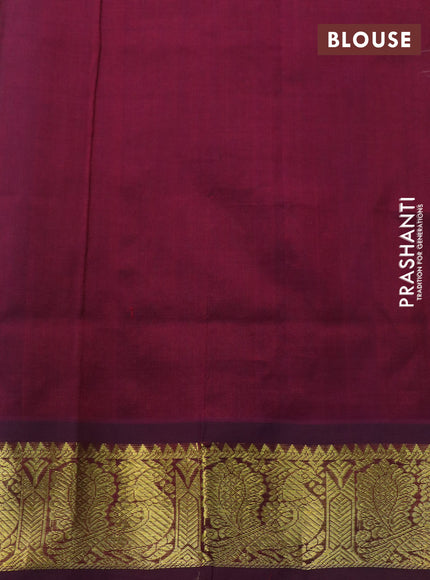 Silk cotton saree teal green and wine shade with zari woven buttas and annam zari woven border