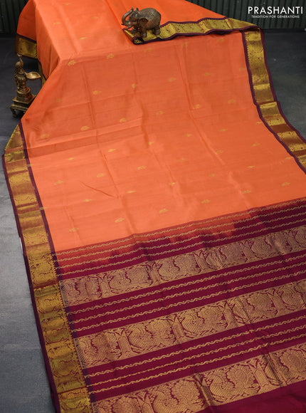 Silk cotton saree orange and wine shade with zari woven buttas and annam zari woven border