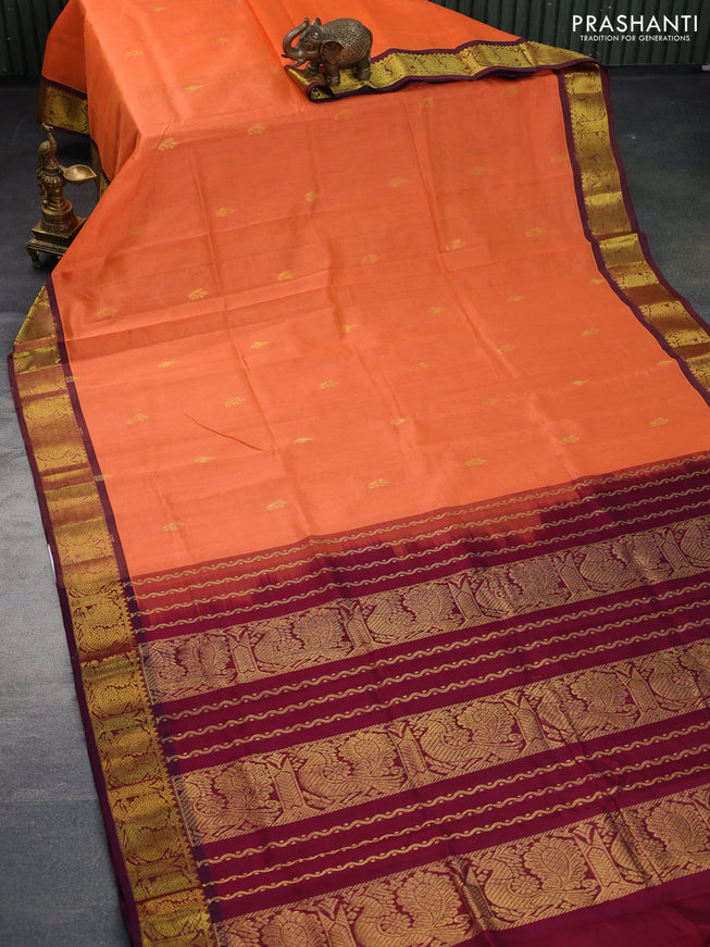 Silk cotton saree orange and wine shade with zari woven buttas and annam zari woven border