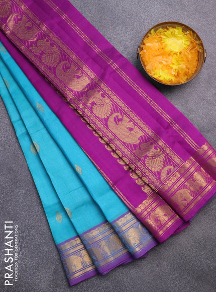 Silk cotton saree teal blue and purple with zari woven buttas and annam & elephant zari woven border