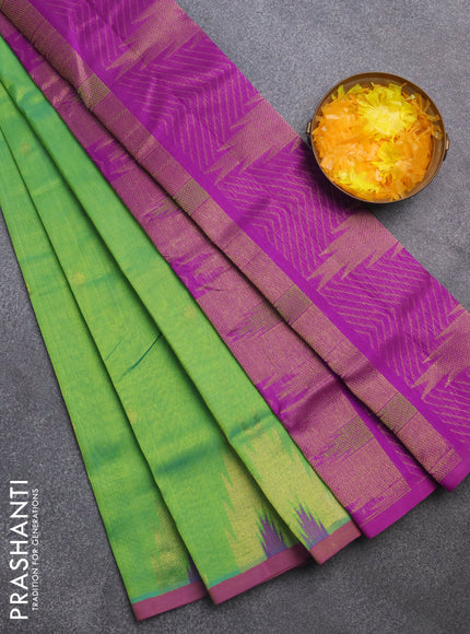 Silk cotton saree light green and purple with zari woven buttas and zari woven temple design border