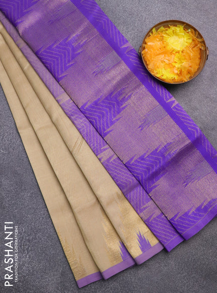 Silk cotton saree beige and violet shade with zari woven buttas and zari woven temple design border