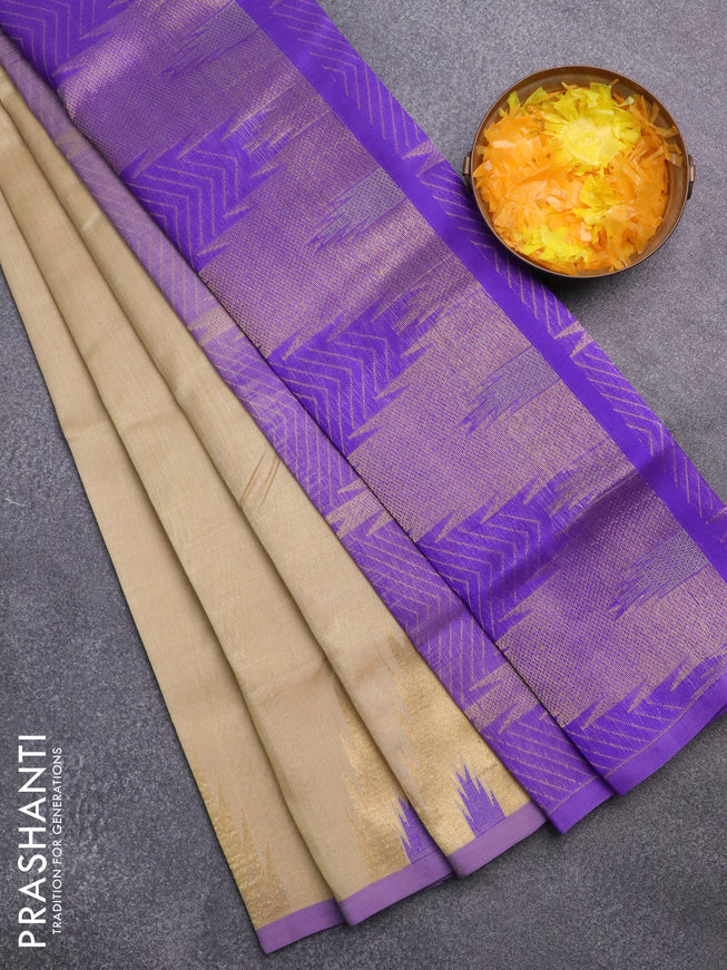 Silk cotton saree beige and violet shade with zari woven buttas and zari woven temple design border