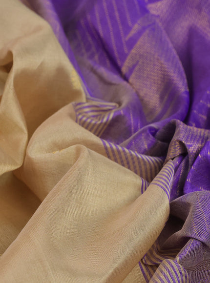 Silk cotton saree beige and violet shade with zari woven buttas and zari woven temple design border