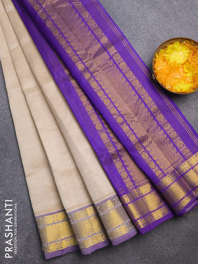 Silk cotton saree cream and blue with allover vairaosi pattern and rudhraksha zari woven border