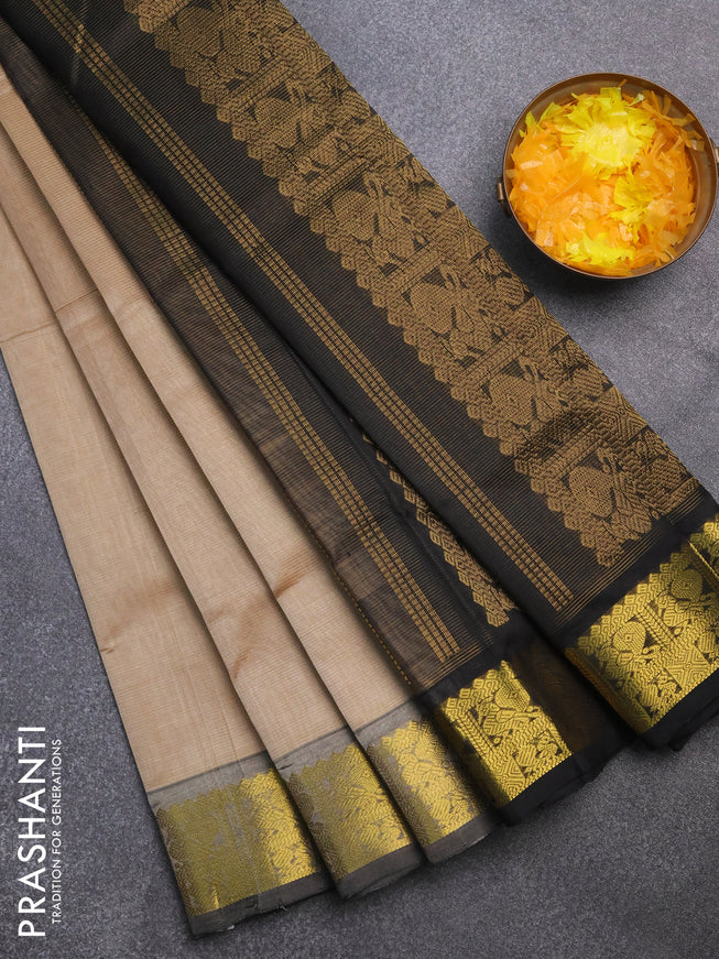 Silk cotton saree beige and black with allover vairaosi pattern and annam zari woven border