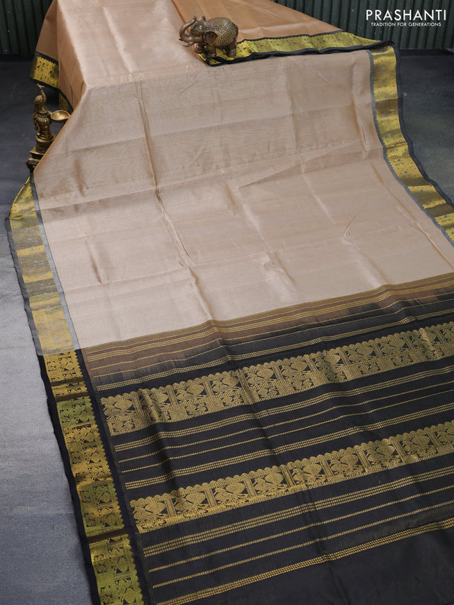 Silk cotton saree beige and black with allover vairaosi pattern and annam zari woven border