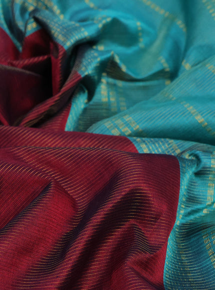 Silk cotton saree maroon and teal blue with allover vairaosi pattern and annam zari woven border