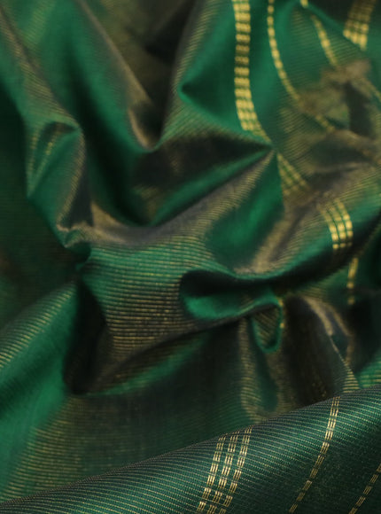 Silk cotton saree green with allover vairaosi pattern and zaro woven border