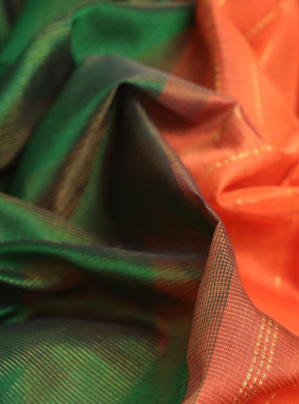 Silk cotton saree green and orange with allover vairaosi pattern and paisley zari woven border