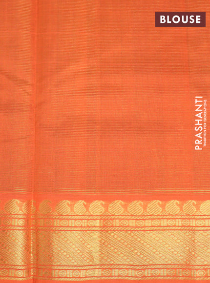 Silk cotton saree green and orange with allover vairaosi pattern and paisley zari woven border