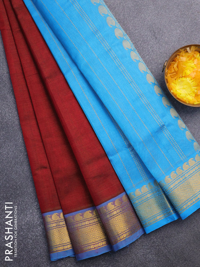 Silk cotton saree maroon and light blue with allover vairaosi pattern and paisley zari woven border