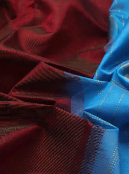 Silk cotton saree maroon and light blue with allover vairaosi pattern and paisley zari woven border