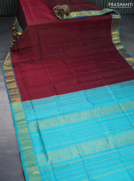 Silk cotton saree deep maroon and teal blue with allover vairaosi pattern and annam & elephant & zari woven border