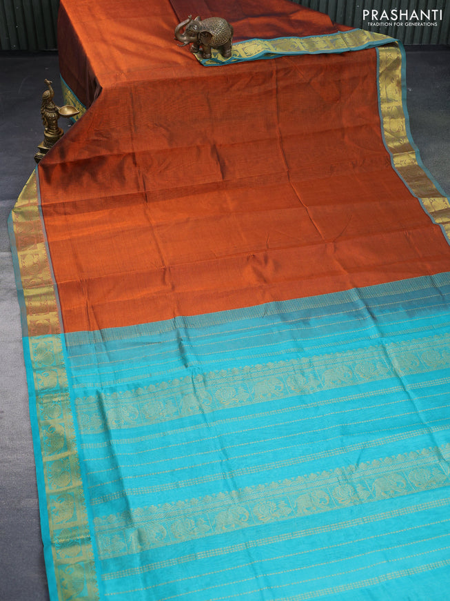 Silk cotton saree orange and teal green with allover vairaosi pattern and annam & elephant & zari woven border