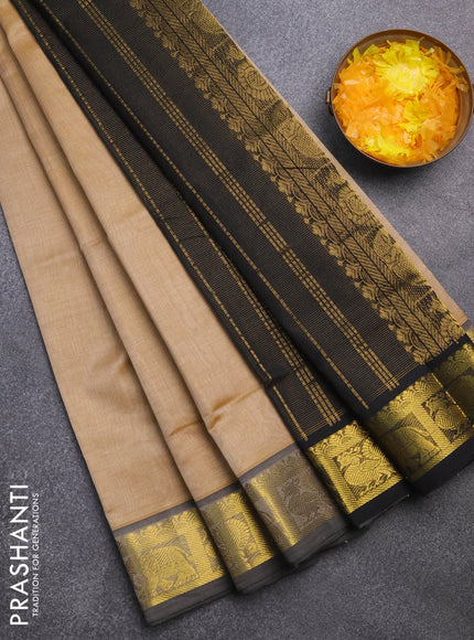 Silk cotton saree sandal and black with allover vairaosi pattern and annam & elephant & zari woven border