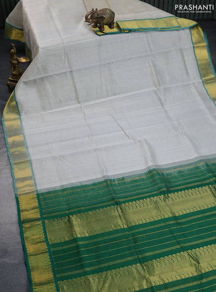 Silk cotton saree grey shade and green with allover vairaosi pattern and zari woven border