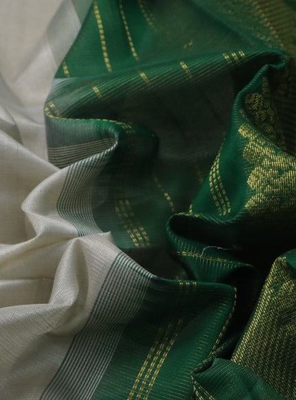 Silk cotton saree grey shade and green with allover vairaosi pattern and zari woven border