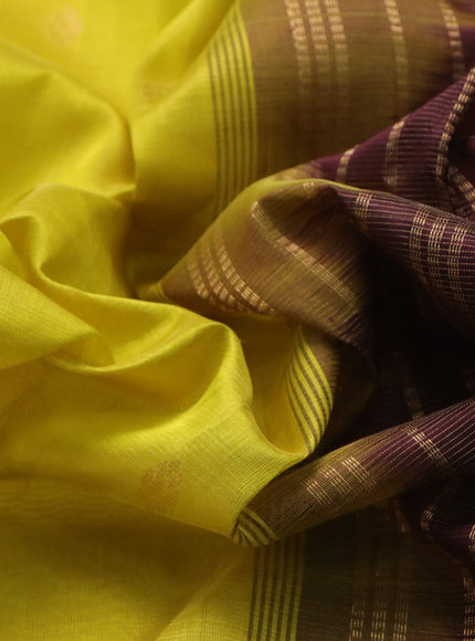 Silk cotton saree lime yellow and coffee brown with allover vairaosi pattern & buttas and zari woven border