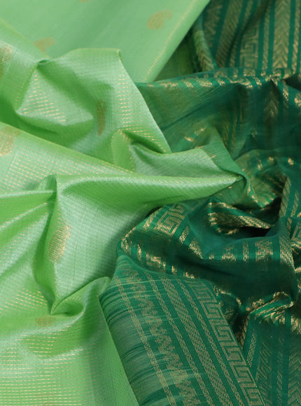 Silk cotton saree pista green and green with allover vairaosi pattern & buttas and zari woven border