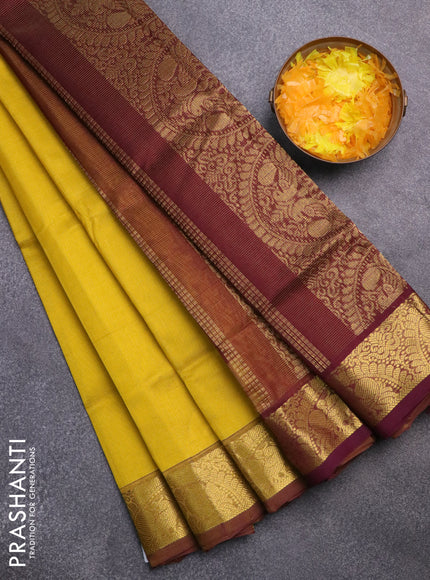 Silk cotton saree yellow and deep brown with allover vairaosi pattern and annam zari woven border