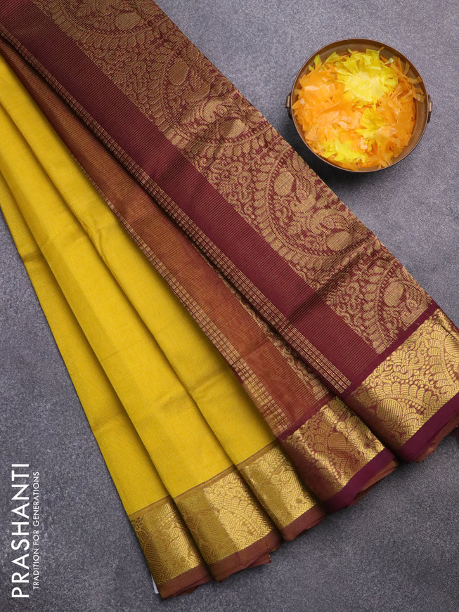 Silk cotton saree yellow and deep brown with allover vairaosi pattern and annam zari woven border