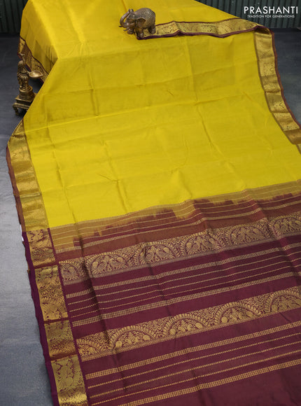 Silk cotton saree yellow and deep brown with allover vairaosi pattern and annam zari woven border