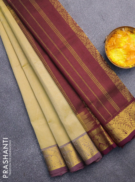 Silk cotton saree pale yellow shade and wine shade with allover vairaosi pattern and annam zari woven border