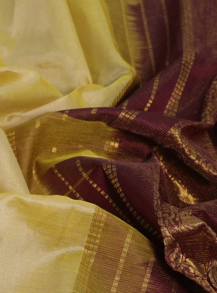 Silk cotton saree pale yellow shade and wine shade with allover vairaosi pattern and annam zari woven border