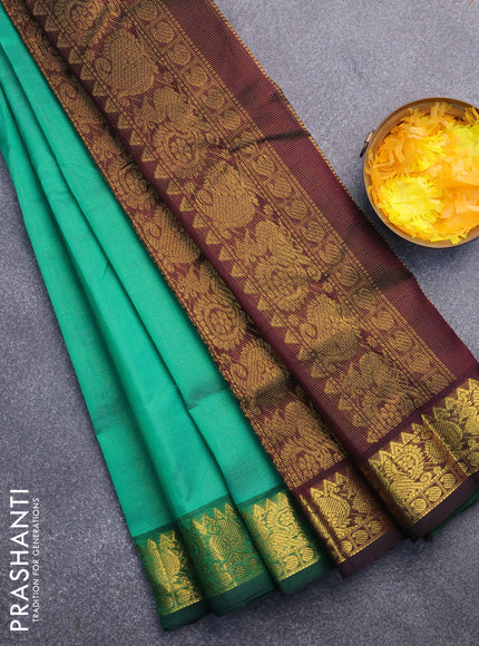 Silk cotton saree green and coffee brown with allover vairaosi pattern and annam & paisley zari woven border