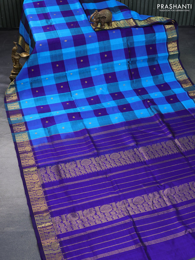 Silk cotton saree light blue and blue with allover paalum pazhamum checks & zari buttas and rich zari woven border